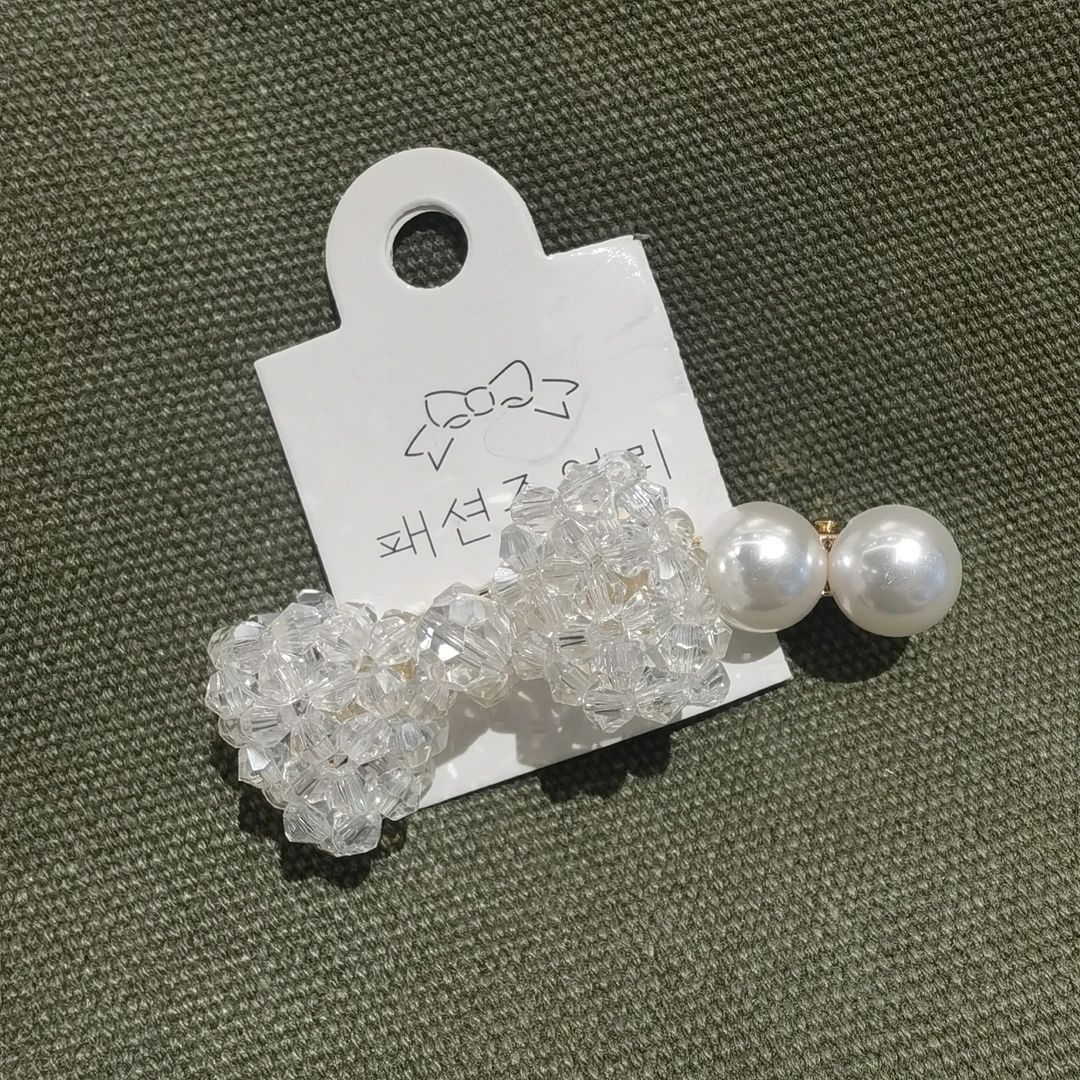 A139白色水水蝴蝶结弯刀边夹