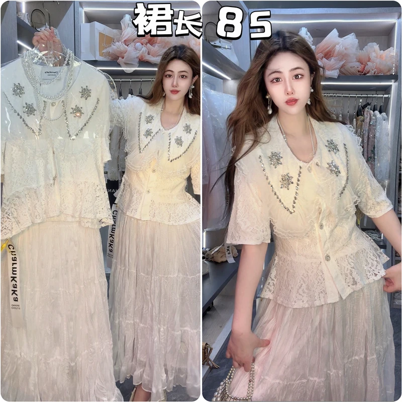 63151重工水钻花朵娃娃领蕾丝钩花衬衫+褶皱半身裙两件套