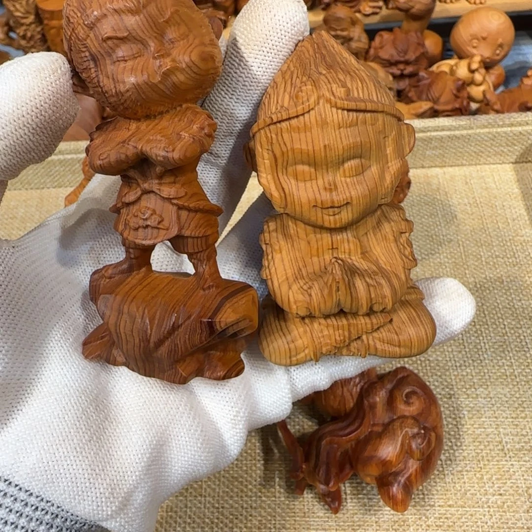 @***晴崖柏手把件猴子两只