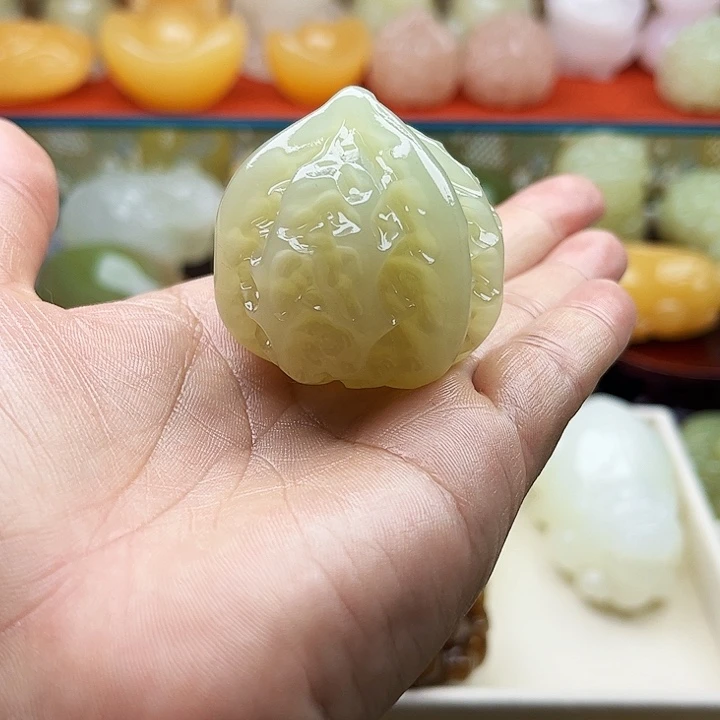霸***哥石材核桃手把摆件