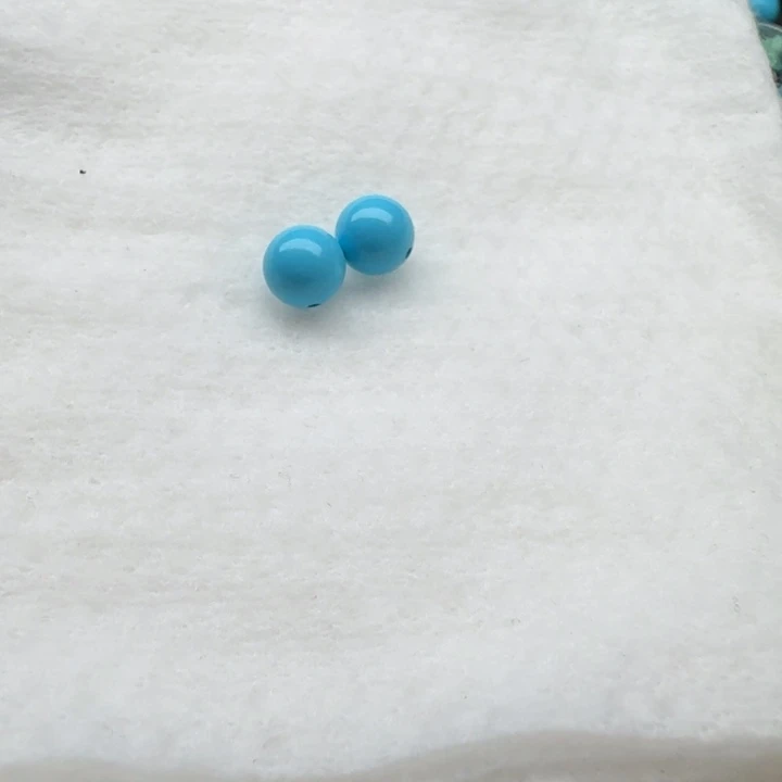 卡8.1蓝圆珠两颗 配珠