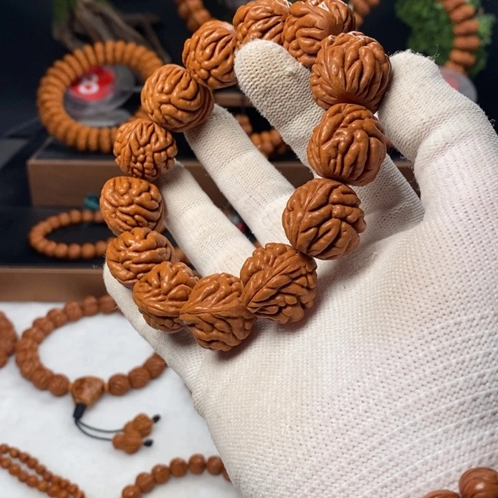 桃核吊坠关**子秦岭龙纹桃核