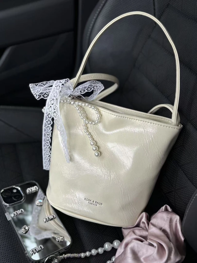 单肩扣式单根斜挎包韩版女士潮流水桶包百搭夏季