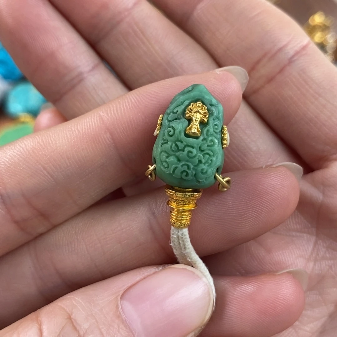 绿松石未镶嵌。兽三通