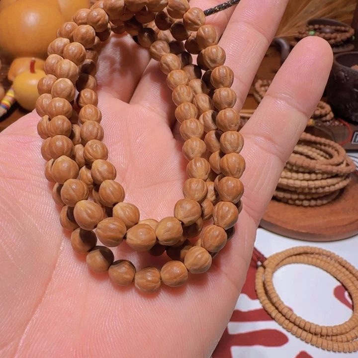 柏香籽/百香籽吊坠红皮原装龙蛋