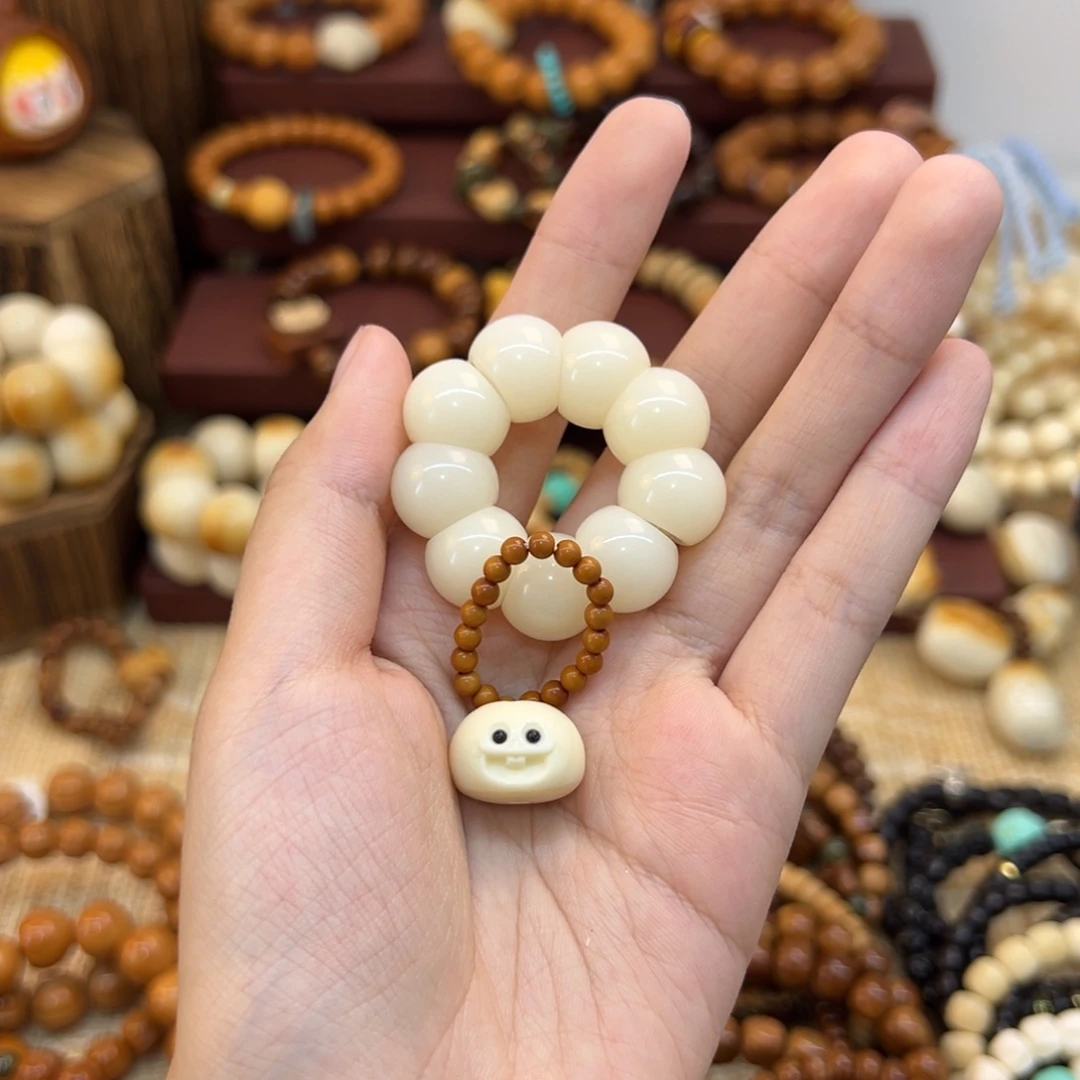 嫒***菩提根/象牙果把件手捻