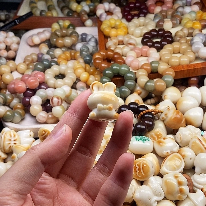 蜜****吊坠菩提根/象牙果10差价
