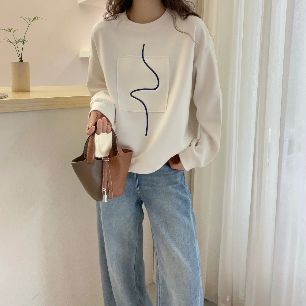 欧洲站2025秋装新款时尚简约百搭线条卫衣女休闲套头棉质长袖上衣