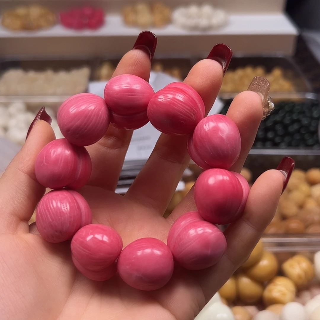 手串菩提根/象牙果瑕疵粉色拉丝屁桃1条表面有裂