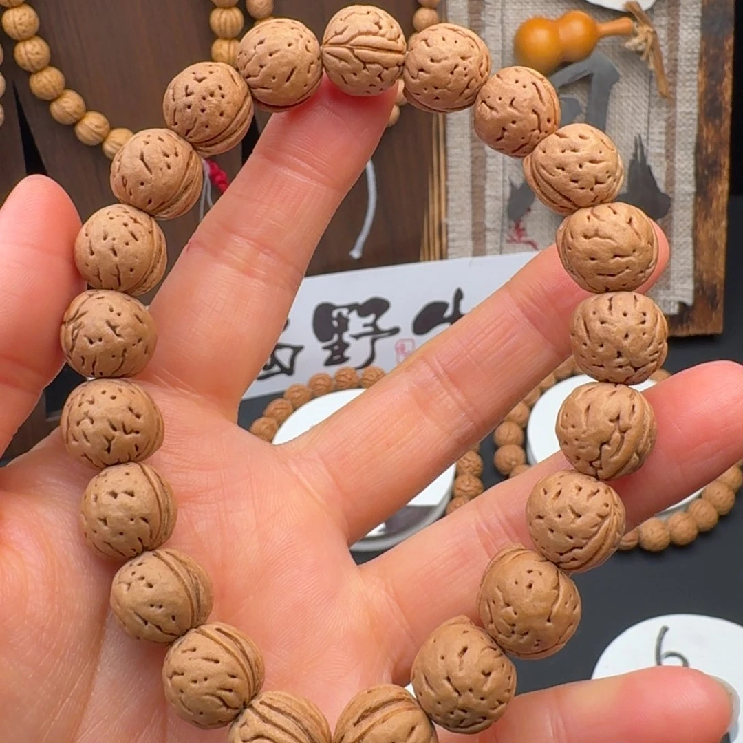 二***哥桃核手串12➕脐中脐手持