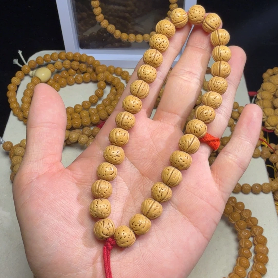 A***博桃核吊坠11X9桃核手持