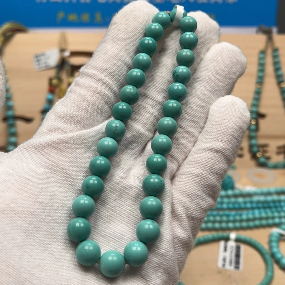 绿松石圆珠手持未镶嵌