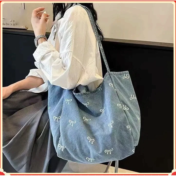 小众单肩蝴蝶结包包夏牛仔布大容量新款通勤休闲百搭时尚2025G