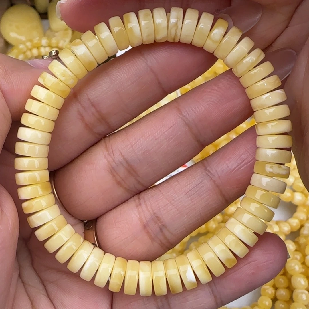 莫***离蜜蜡未镶嵌手链浓白花药片手串