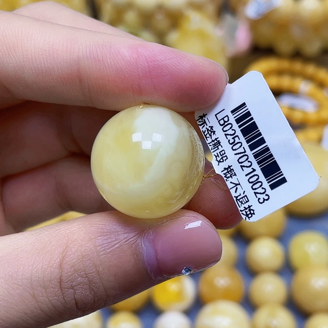 蜜蜡未镶嵌裸石21.2mm瑕疵