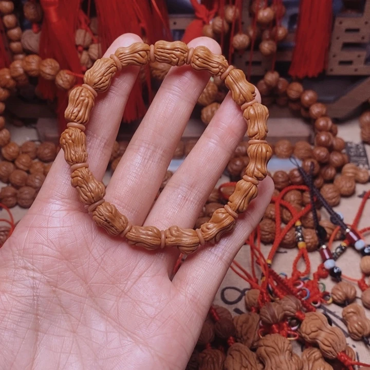 吊坠桃核桃枭手串