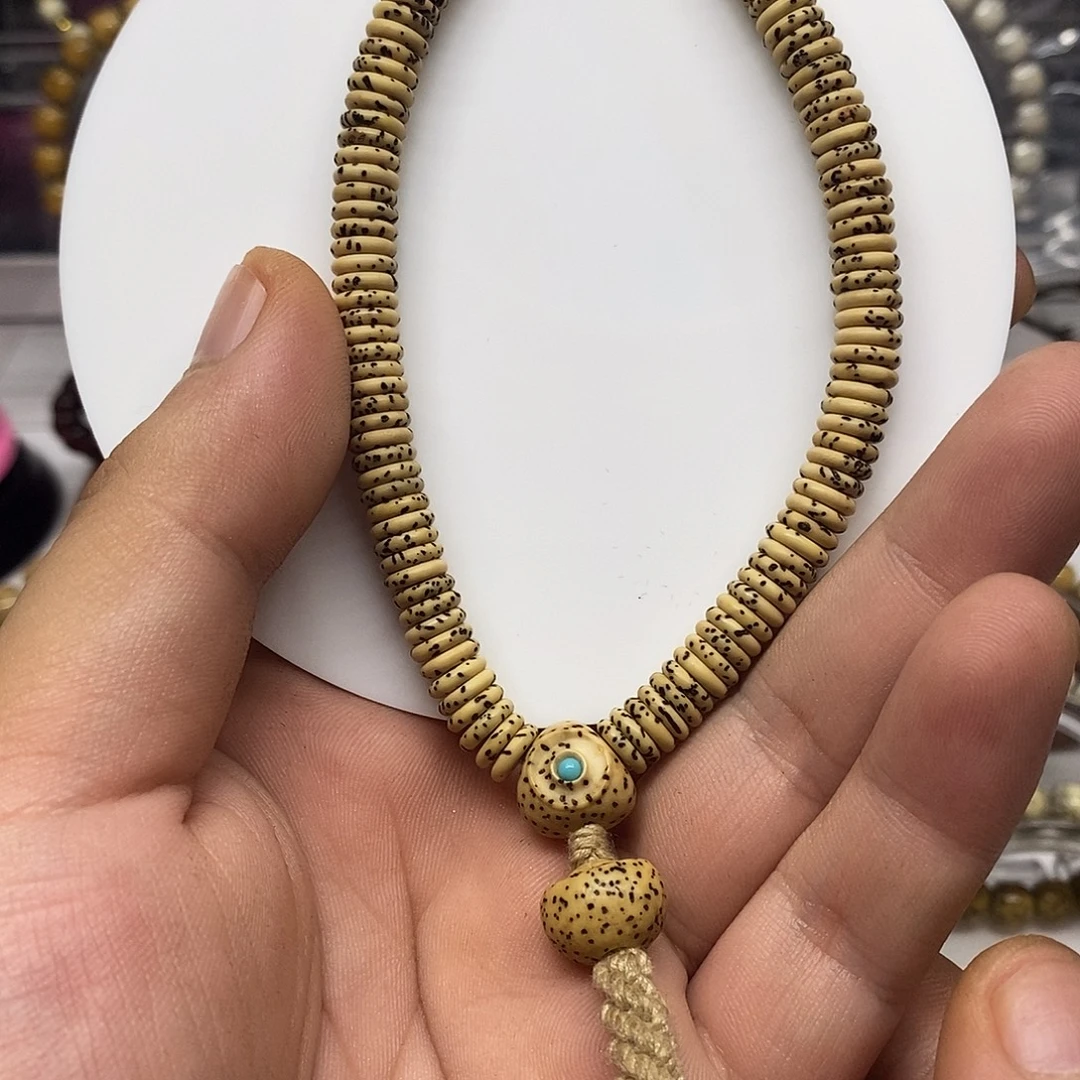 星月菩提吊坠泥鳅背手持