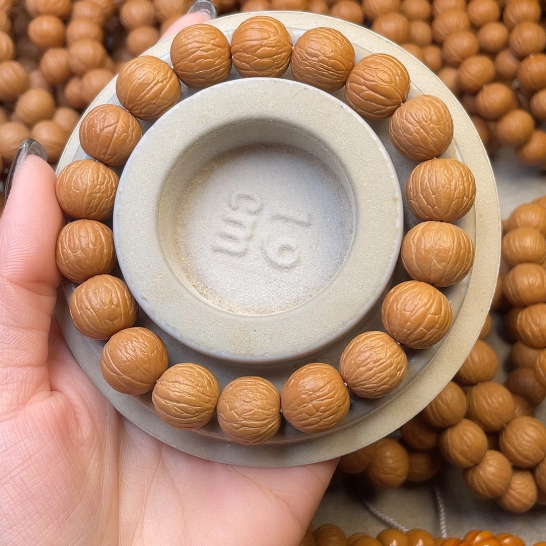 A***o猴头核桃手串聚宝盆