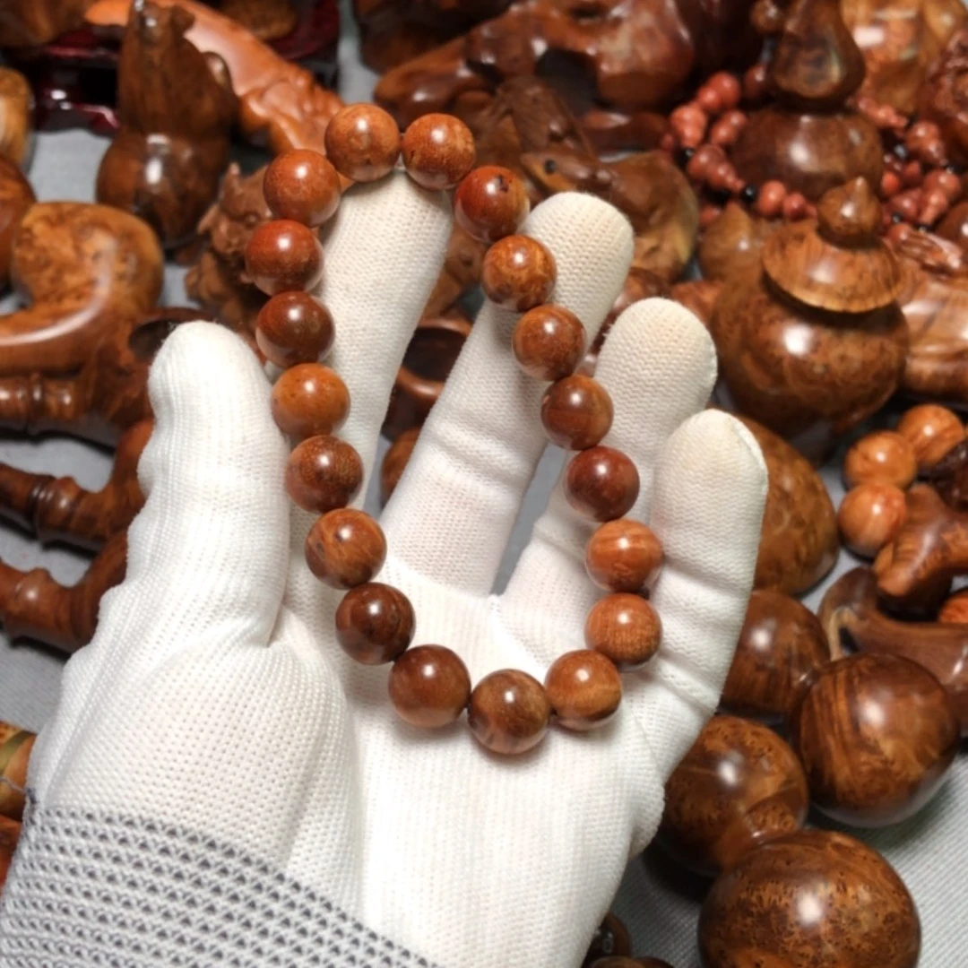 【闪购商品】木齐****宝麻梨疙瘩火琉璃手把件