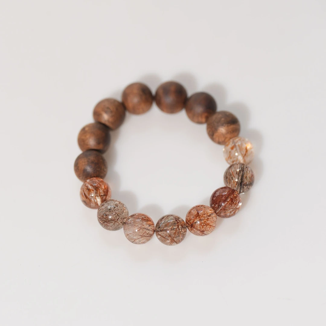 沉香「黑金超七」海南沉香14mm圆珠黑金超七设计款沉香手串