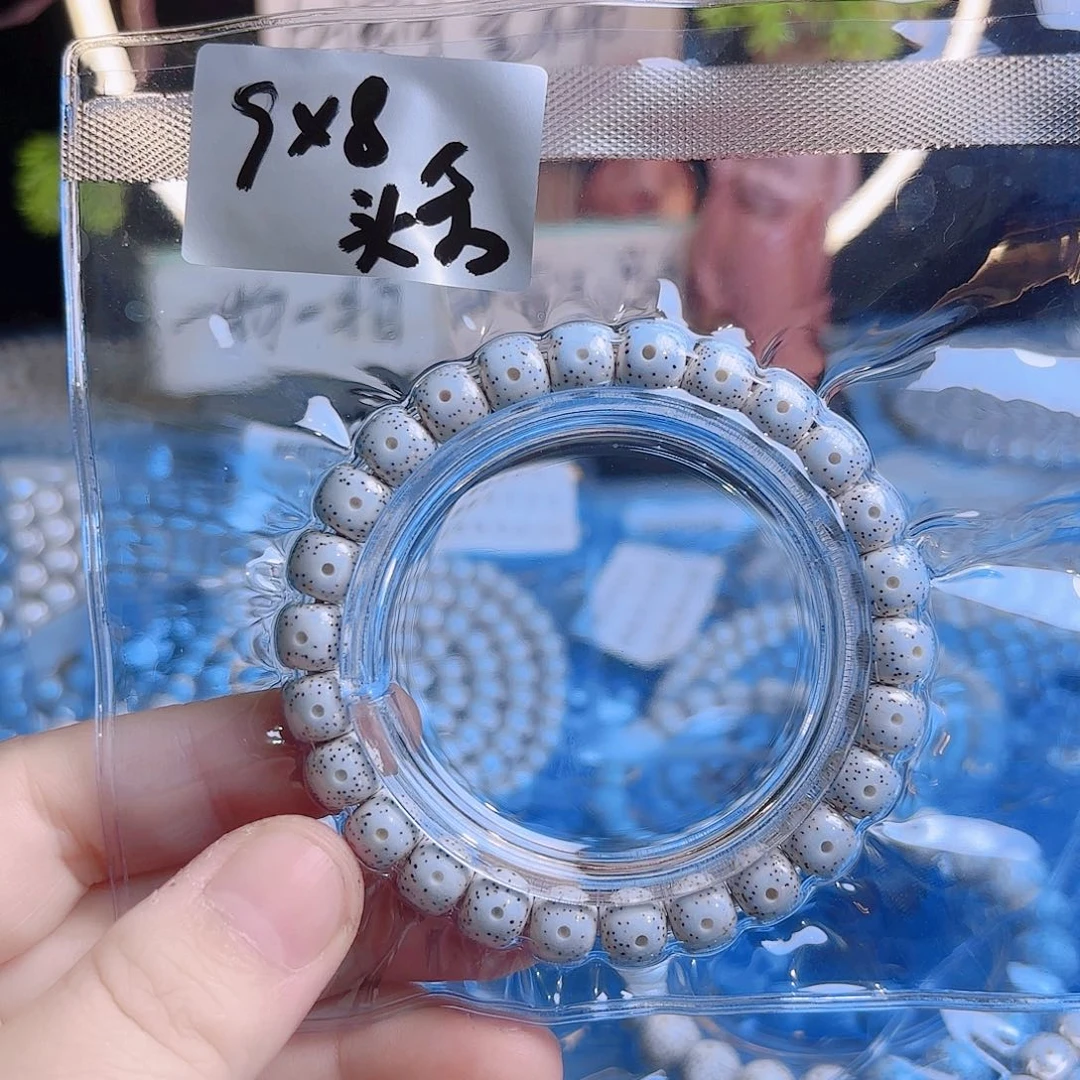我***面吊坠菩提根/象牙果