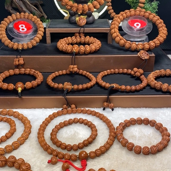 桃核吊坠智****享秦岭龙纹