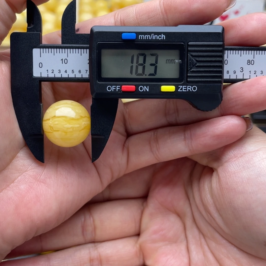 Z***8琥珀未镶嵌裸石蜜蜡圆珠笑