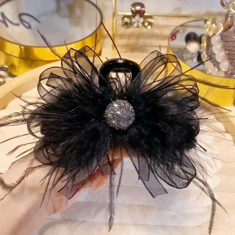 2025新款气质小香风黑色超仙羽毛抓夹后脑勺高级感鲨鱼夹发抓头饰