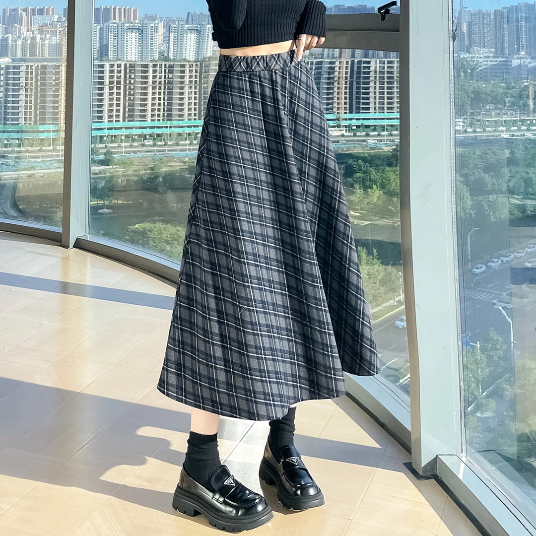 气质中长款格子裙女2025秋季新款高腰百搭显瘦复古毛呢A字半身裙