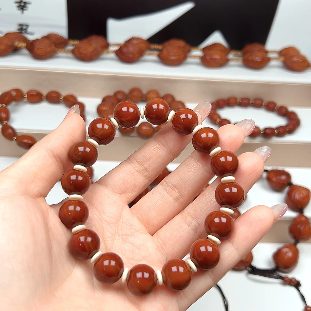 斯***哥手串橄榄核光珠手啊