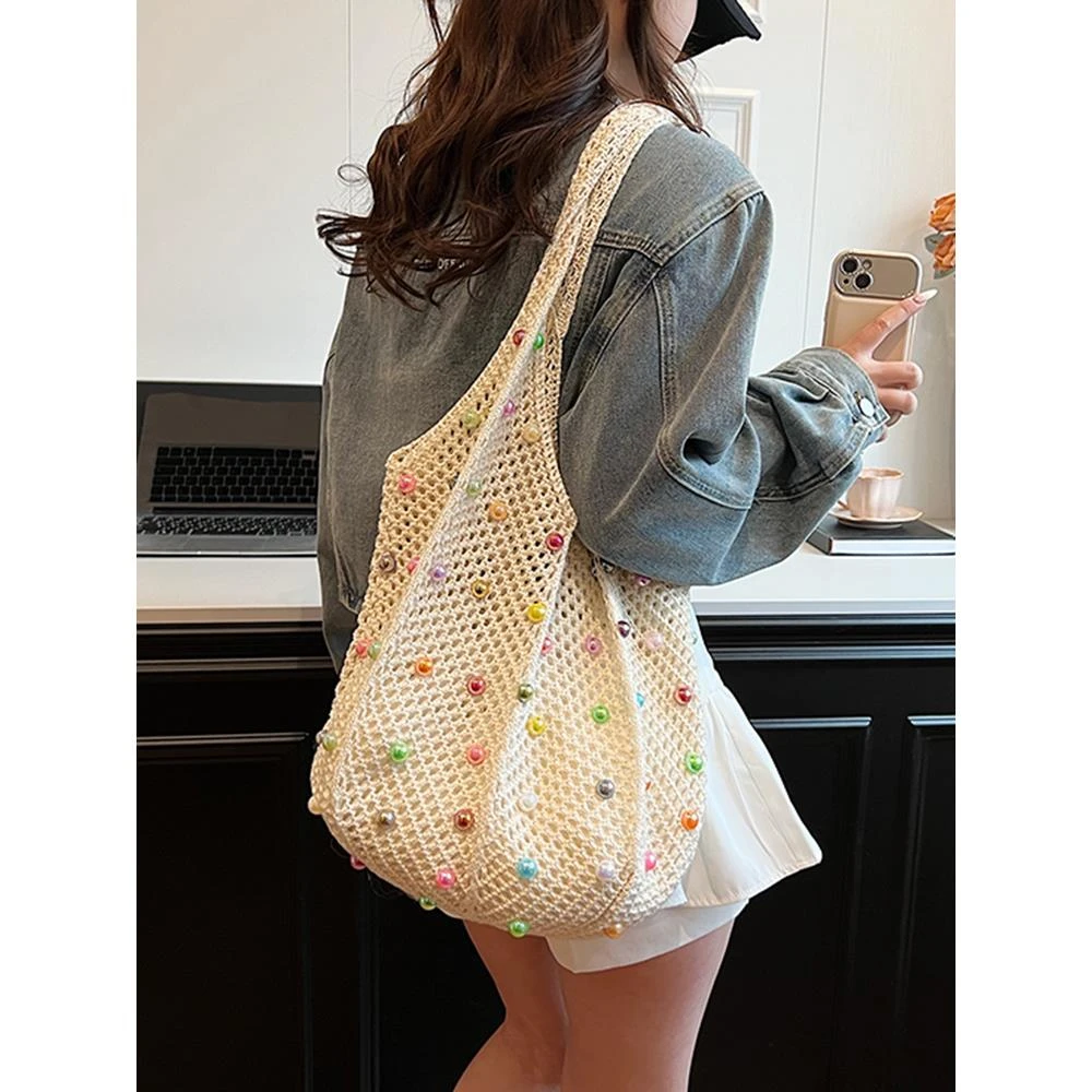 大容量编织镂空针织包女2025新款春夏慵懒风单肩包海边度假沙滩包