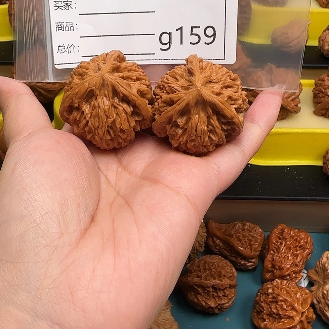 鹤***讯橄榄核吊坠文玩的