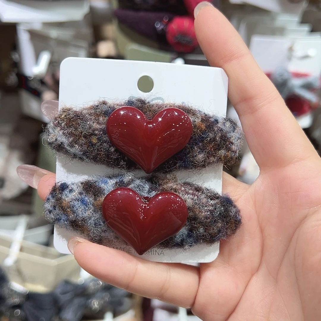 羽毛铁合金红色爱心椭圆