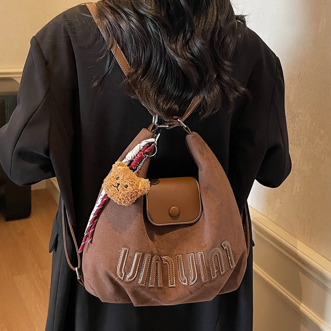 通勤饺子包女大容量2025新款小众设计单肩包休闲多功能双肩包背包