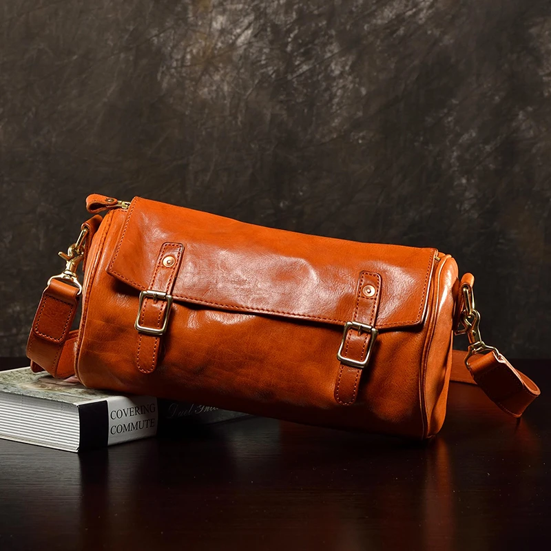 真皮斜挎包牛皮男包休闲单肩包复古风时尚圆筒包潮流韩版中性腰鼓