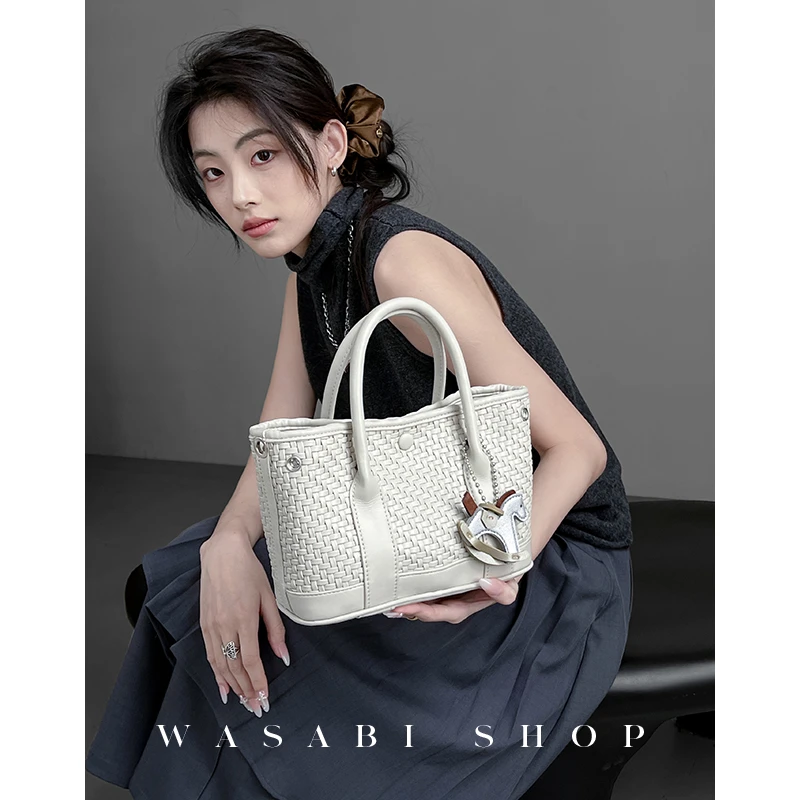 Vibe Ring2025春夏新款小众设计纯手工编织手提单肩斜跨花园包