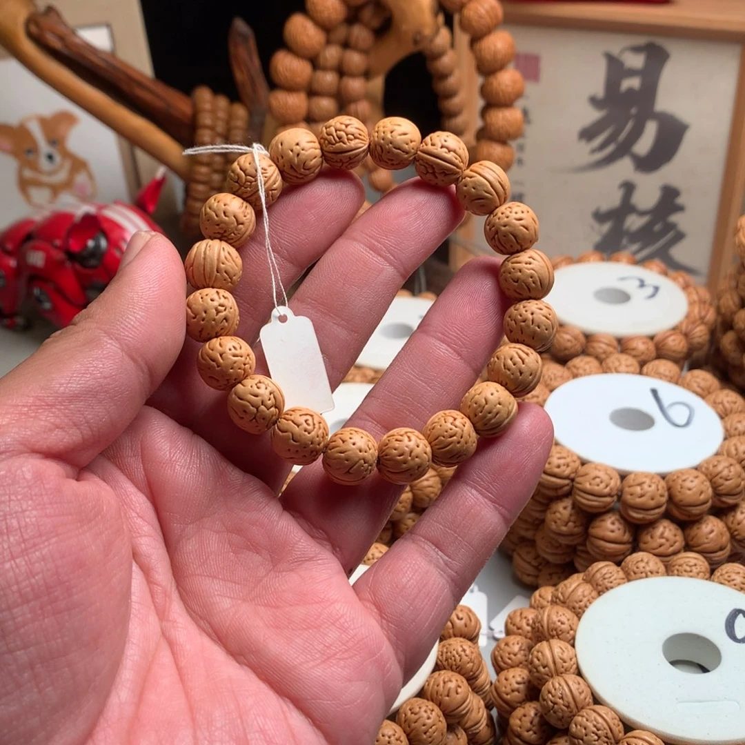 一***兽桃核手串1.2小金芽桃核手串