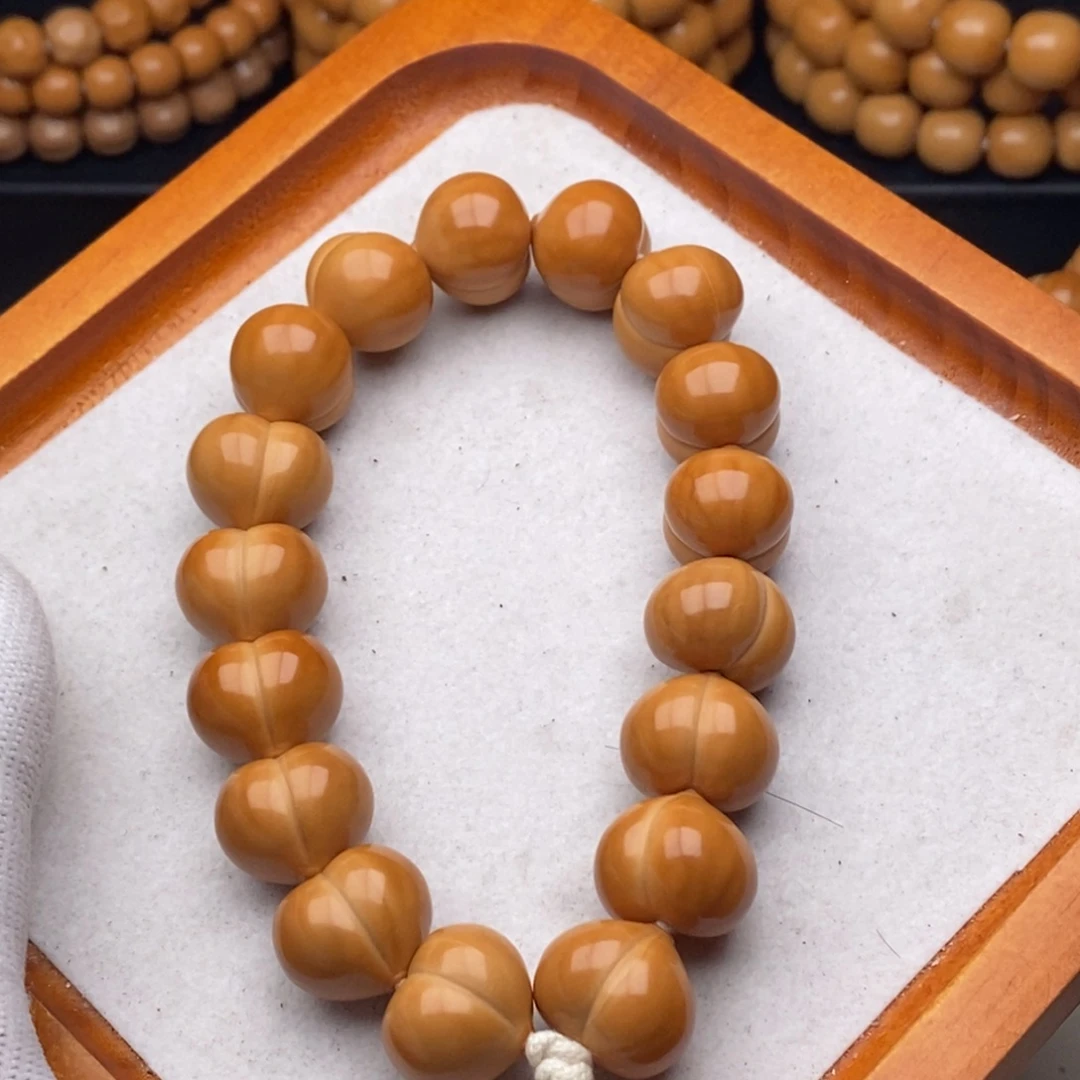 丢***丢吊坠猴头核桃聚宝盆屁桃