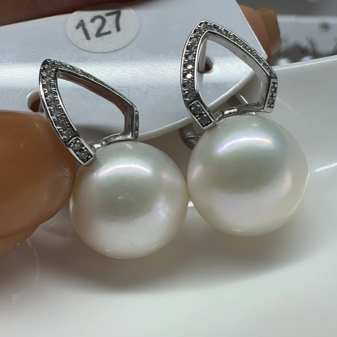 莫***卡淡水珍珠耳饰银S925镶嵌珍珠