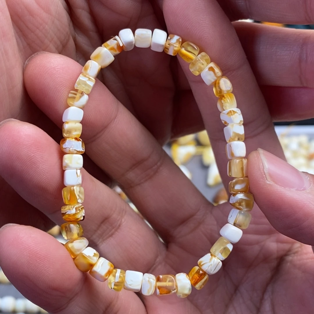 琥珀未镶嵌裸石金瓷白5mm左右