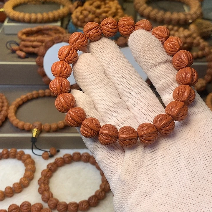 ****.桃核手串秦岭龙纹