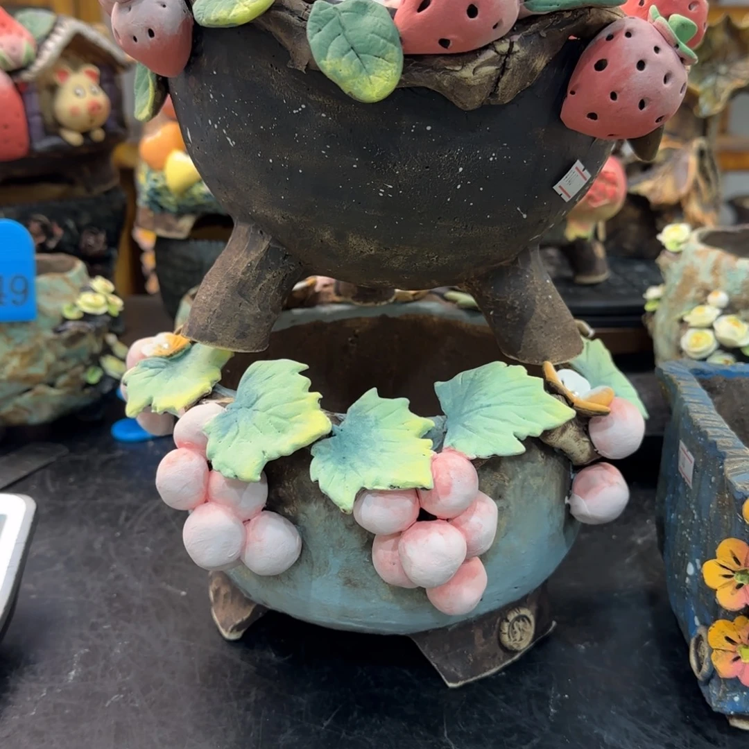 刘***.本默花器麦饭石花盆