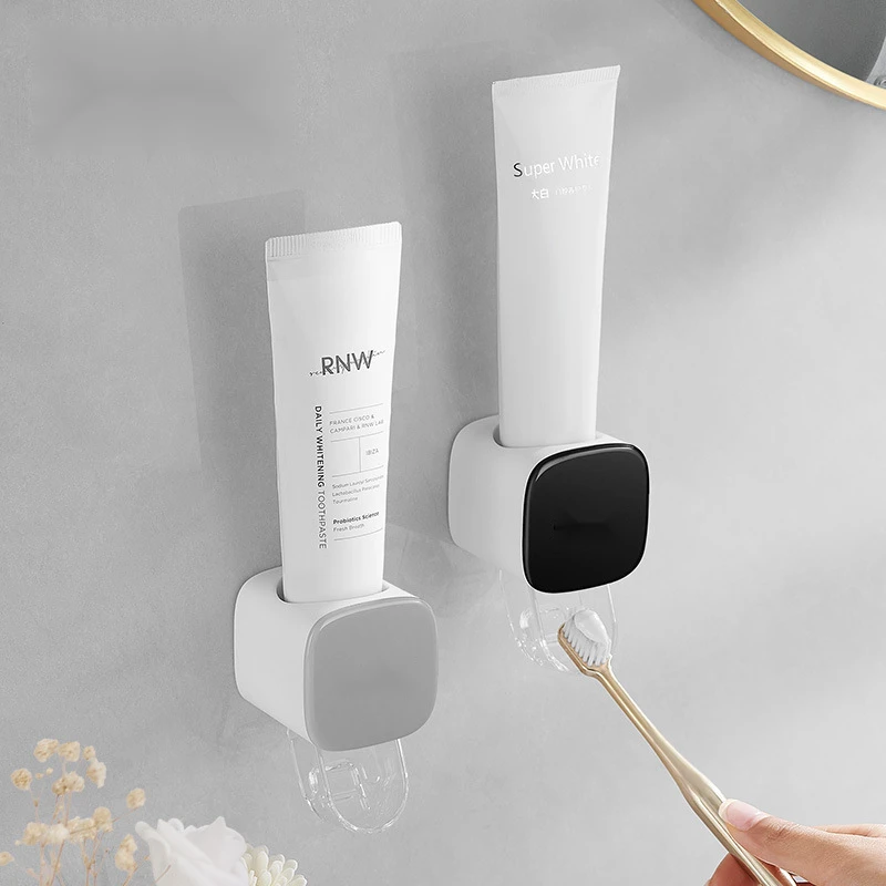 挤牙膏神器牙膏置物架2025新款全自动牙膏架壁挂式儿童牙膏挤压器