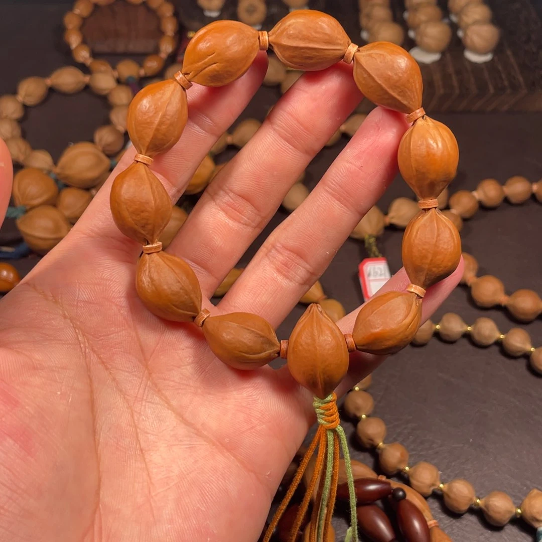 吊坠橄榄核梅林铁核存放20年