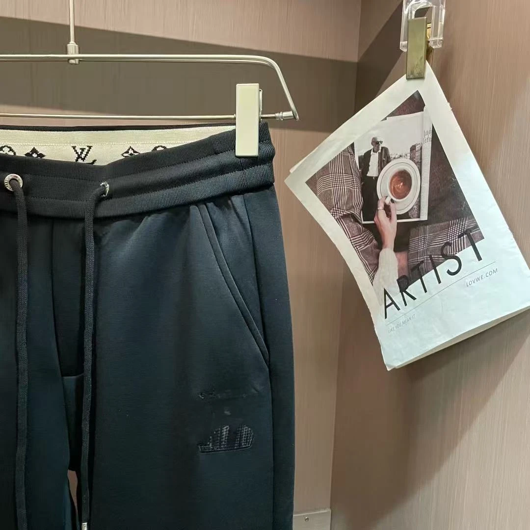 春秋时尚百搭刺绣小标针织束脚休闲长裤男士弹力修身运动裤