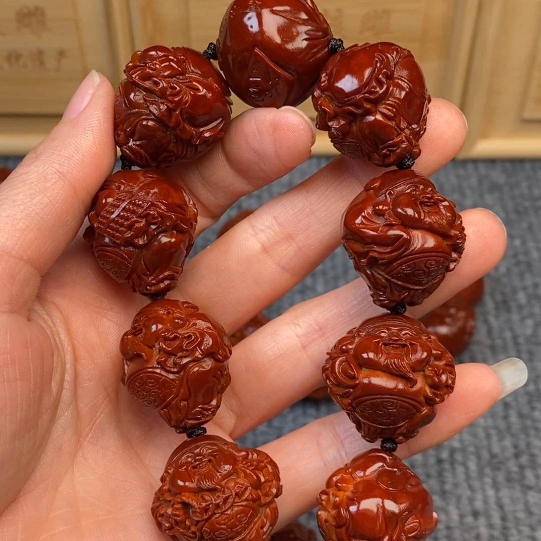 卢***铭橄榄核手串/手链财神