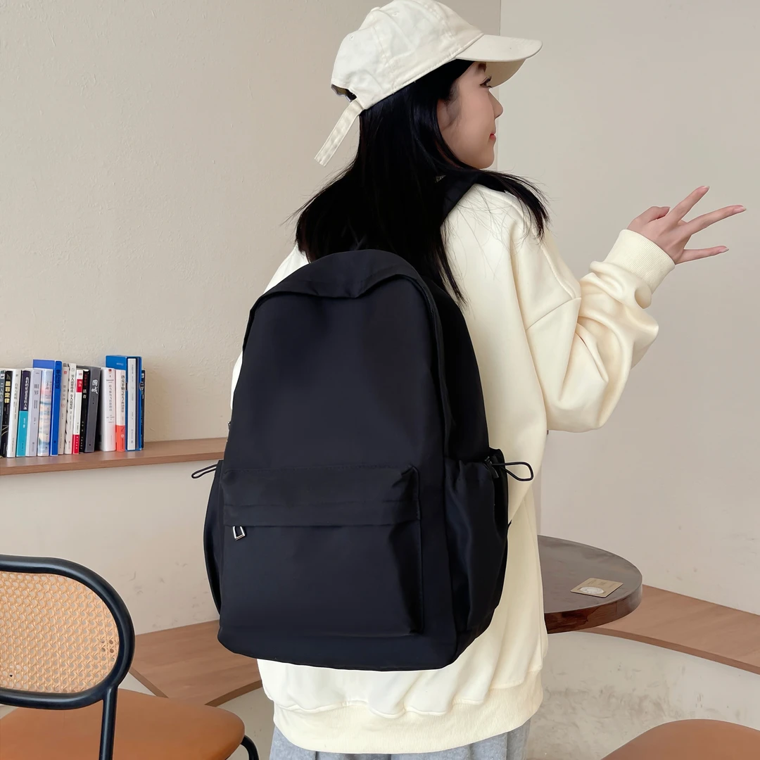 新款日韩时尚休闲百搭初中生大学生双肩包轻便大容量旅行双肩背