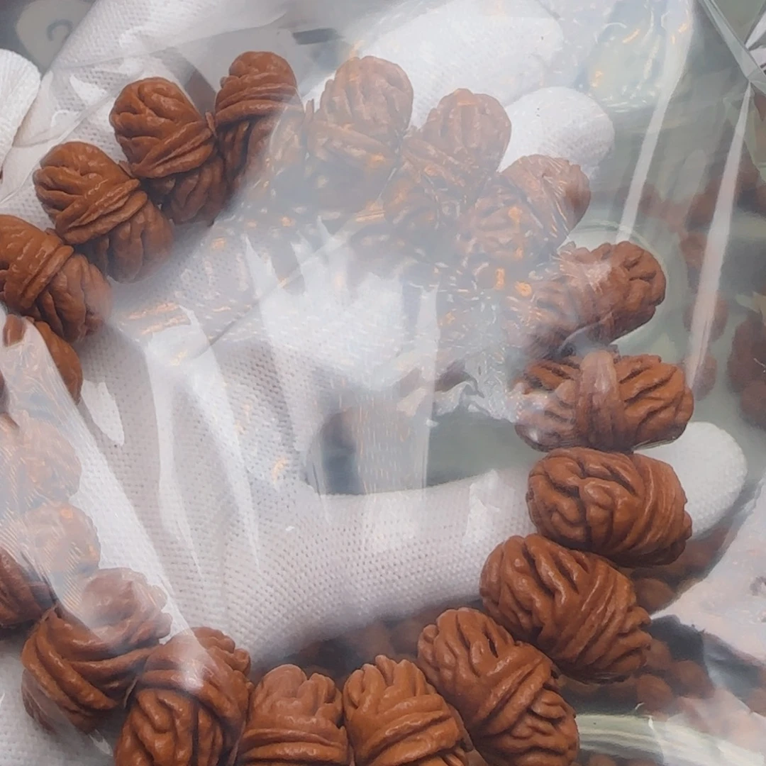 金***鹏手串桃核刺龙手串