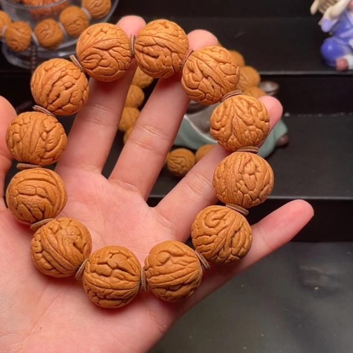 桃核手串金丝龙珠22