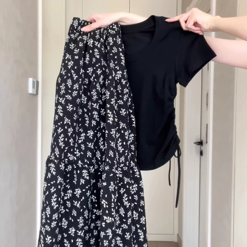 黑色碎花半身裙女2025年夏季新款显瘦遮胯百搭高腰a字半裙中长裙